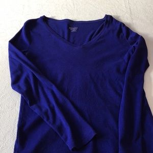 Navy v neck long sleeve shirt.